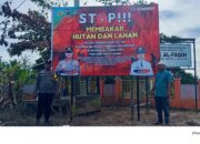Jaga Marwah Negeri, Polsek Rambah Hilir Pasang Baliho Larangan Karhutla di Riau