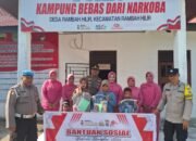 Kapolsek Ipda Jonnes Pimpin Langsung Bakti Sosial Hari Bhayangkara ke-79 di Rambah Hilir
