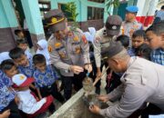 Polsek Bukit Kapur Gaungkan Green Policing lewat Aksi Tanam Pohon di SDN 05 Bukit Nenas
