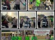 Indahnya Berbagi di Ramadhan, Polres Rohul Bersama Mahasiswa Turun ke Jalan Bagikan Takjil dan Sembako