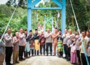 Polri Resmikan Jembatan Gantung Merah Putih Presisi di Rambah Hilir, Warga dan Pelajar Nikmati Akses Mudah dan Aman