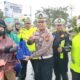 Bagikan Helm Gratis dan Bibit Mangga, Ditlantas Polda Riau Gaungkan Keselamatan dan Kepedulian Lingkungan