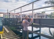 Gotong Royong Polri, Brimob dan Warga Bangun Jembatan Merah Putih Presisi di Dumai